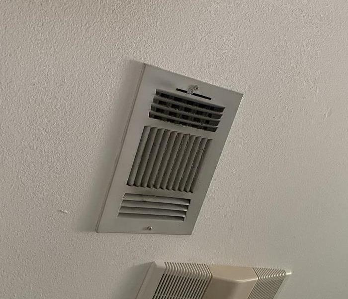 Duct vent that has been collecting dust
