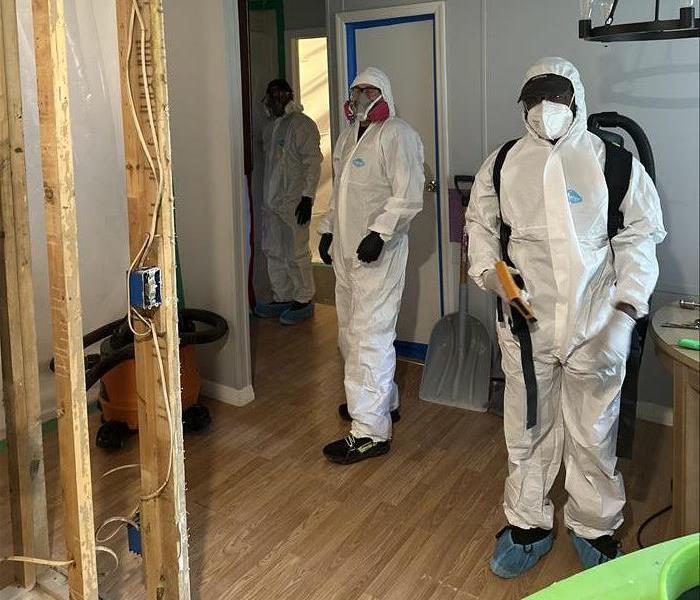 SERVPRO team in PPE at biohazard job